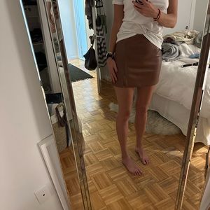 Tan/Brown pleather mini skirt with a slit in front